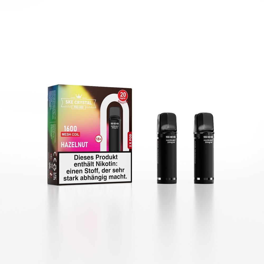 SKE Crystal 800 Pro Pods - Hazelnut Verpackung SKE Crystal Pro Pods Hazelnut 20mg mit zwei schwarzen Pods, Hinweis auf Nikotinabhaengigkeit, bunter Hintergrund
