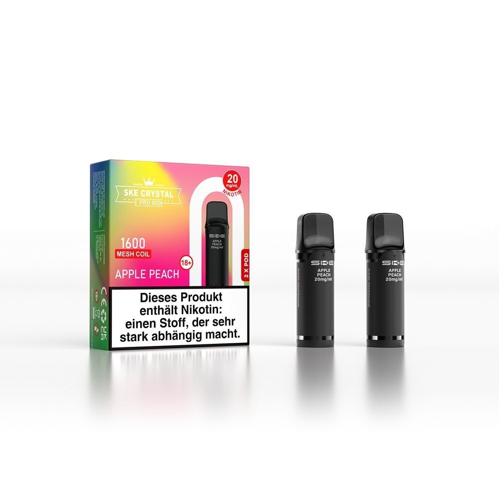 SKE Crystal 800 Pro Pods - Apple Peach SKE Crystal Pro Pods Apple Peach 20mg mit zwei schwarzen Pods und einer farbigen Verpackung mit Nikotinwarnung.
