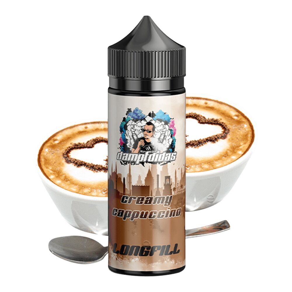 Aroma Creamy Cappuccino von Dampfdidas Dampfdidas Aroma Creamy Cappuccino Flasche mit Kaffeetassen im Hintergrund, verziert mit Herzmotiven aus Kakaopulver.