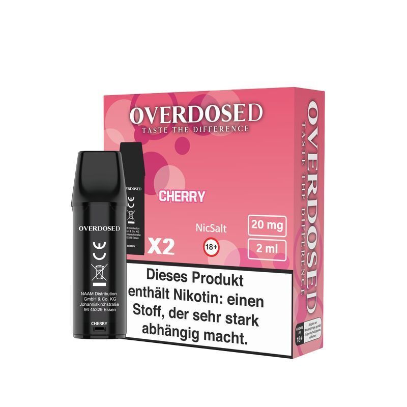 Cherry 20mg - Overdosed Pods Overdosed Pods Cherry 20mg Verpackung mit Nikotinhinweis, pinker Hintergrund, zwei schwarze Pods sichtbar, NicSalt 2ml Angabe.