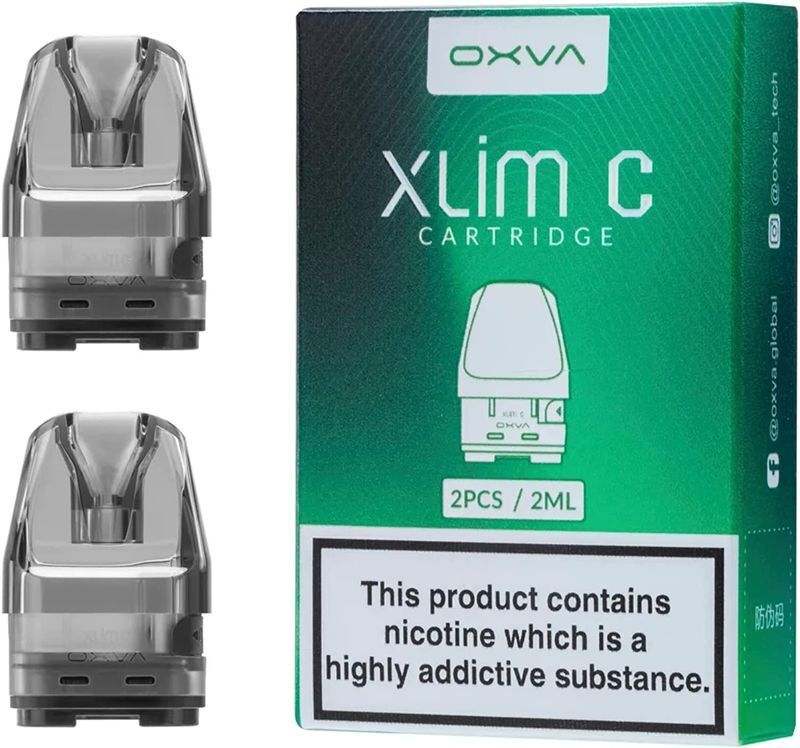 Zwei transparente Oxva Xlim C Leerpods neben einer grünen Verpackung mit Aufschrift "2PCS/2ML" und Warnung "This product contains nicotine".