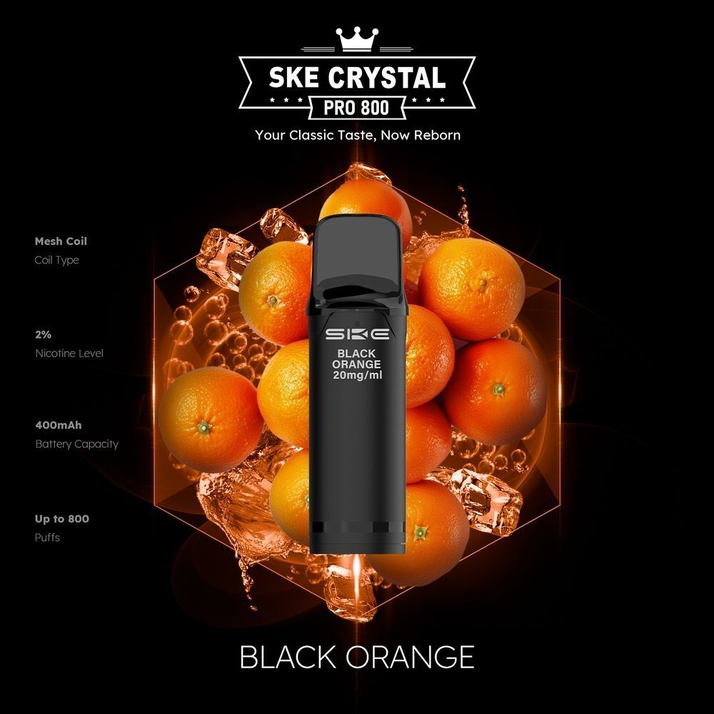 SKE Crystal 800 Pro Pods - Black Orange SKE Crystal Pro Pods Black Orange 20mg mit Orangen im Hintergrund, zeigt auf der Vorderseite Produktinformationen und technische Spezifikationen.