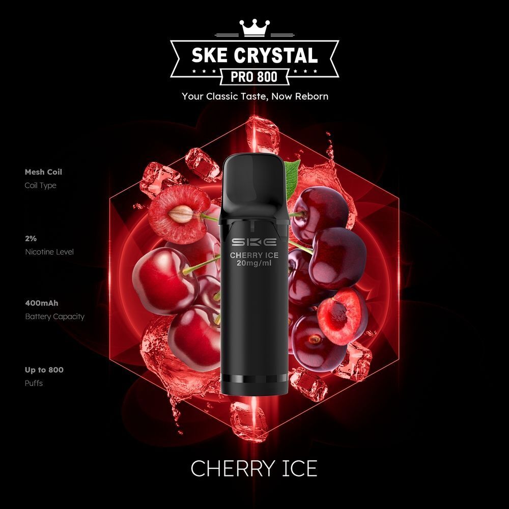 SKE Crystal 800 Pro Pods - Cherry Ice SKE Crystal Pro Pods Cherry Ice 20mg, umgeben von Kirschen und Eiswürfeln, schwarzer Hintergrund, Details zu Mesh Coil und 2 % Nikotingehalt.