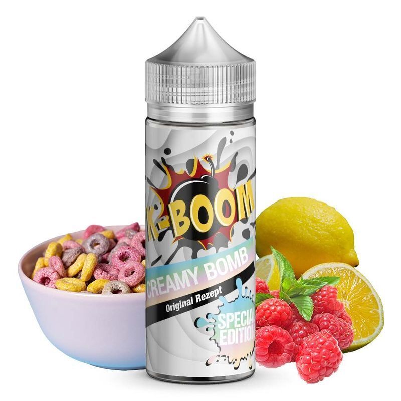 Aroma Creamy Bomb von K-Boom K-Boom Aroma Creamy Bomb Flasche, daneben eine Schale bunte Cerealien, eine Zitrone und einige Himbeeren, Special Edition Design