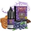 Owliq Nikotinsalz-Flasche und Verpackung mit Eule-Motiv, umgeben von Blaubeeren, Zimtstangen und Zimtschnecken; enthält 10 mg Nikotin.